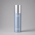 A light blue cylindrical cosmetic bottle with a metallic silver cap, labeled 'BOTULCARE AMPOULE' and 'AROCELL', centered on a neutral gray background.